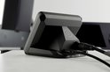 Zwarte Elgato XLR Dock MK.2 met aangesloten kabels, achterkant zichtbaar met USB-, hoofdtelefoon- en microfoonsymbolen.