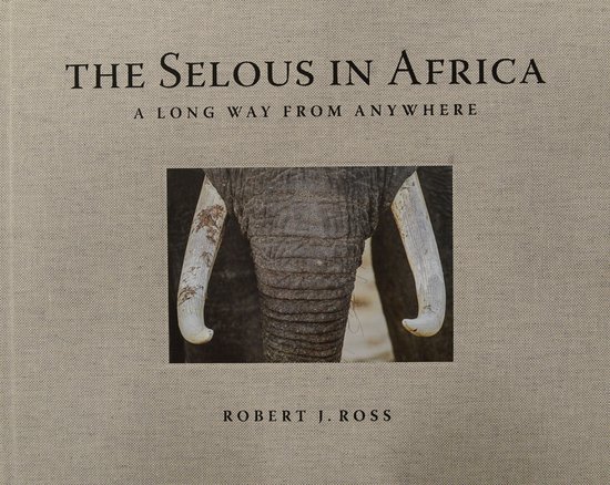 Boek met de titel "The Selous in Africa" en "A Long Way From Anywhere". Afbeelding van een olifantenslurf en slagtanden.