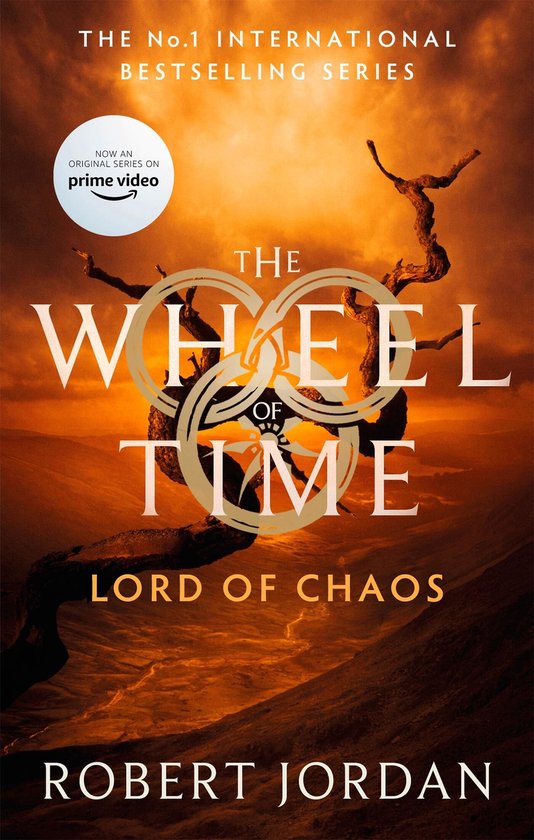 Boekomslag van 'Lord of Chaos' uit The Wheel of Time serie, met een gouden wiel-symbool tegen een oranje woestijnlandschap.