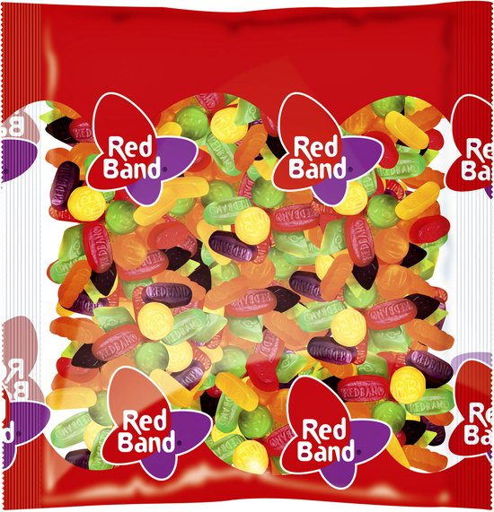 Een doorzichtige zak gevuld met kleurrijke Red Band snoepjes.