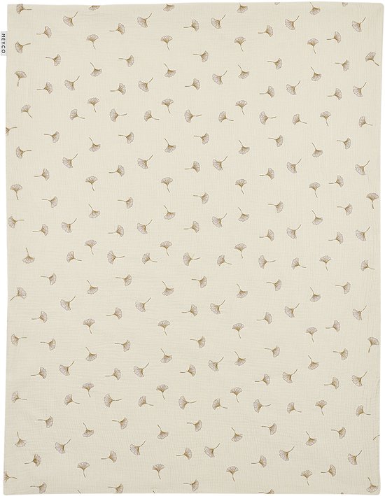 Witte hydrofiele deken met bruine ginkgo bladeren print, label 'Meyco'.