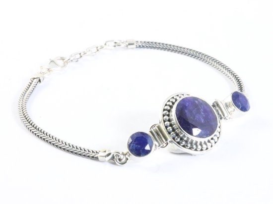 Bracelet en argent décoré avec saphir bleu
