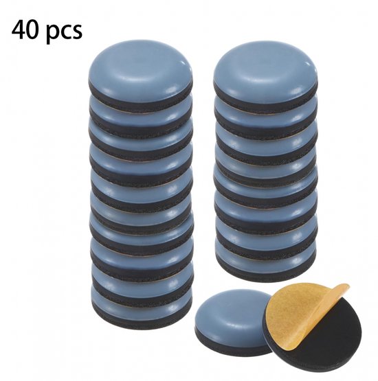 Twee stapels van 20 grijze ronde meubeldopjes, met een los dopje dat de zelfklevende achterkant laat zien. Tekst: 40 pcs.