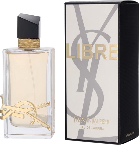 Parfumfles met gouden 'YSL'-logo en doosje met 'LIBRE' in gouden letters.