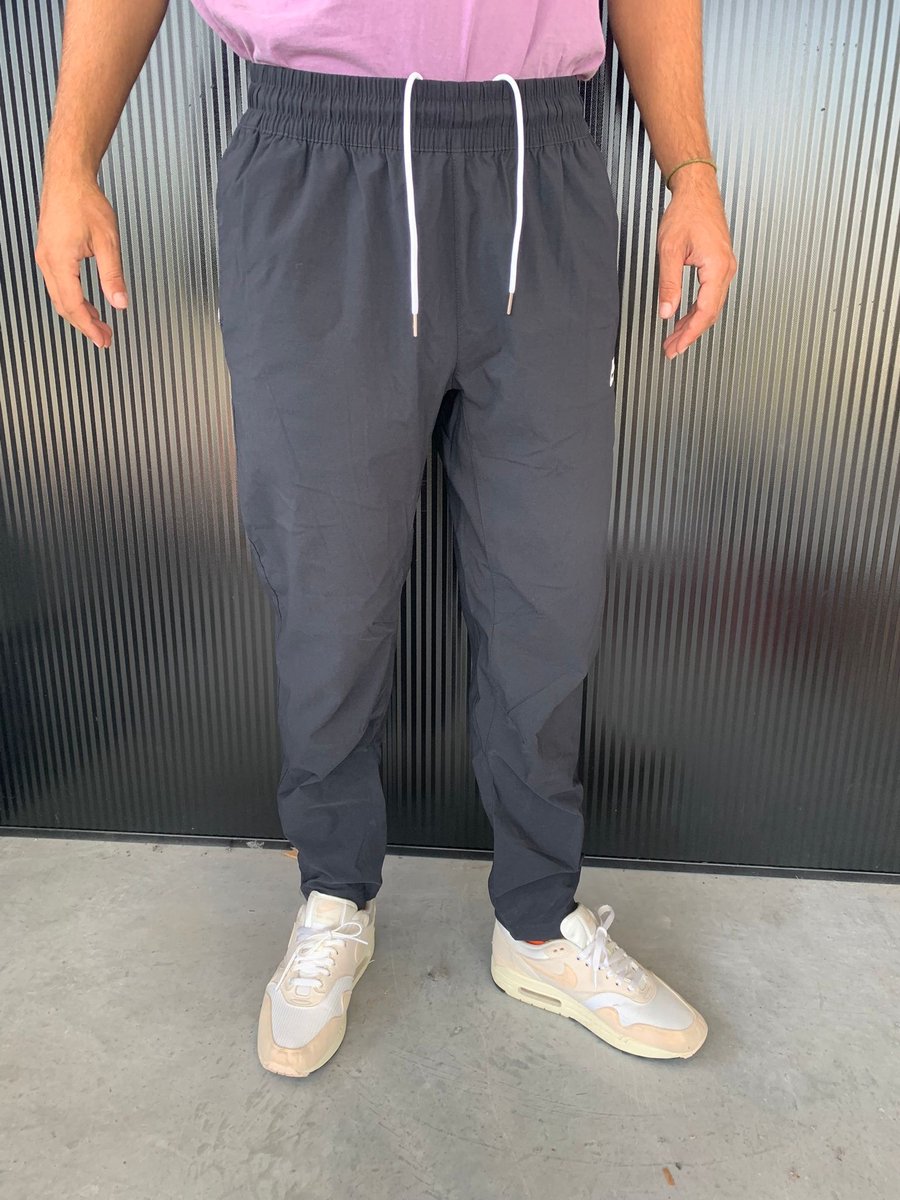 Nike Trainingsbroek – Standard Fit Taper Leg Mannen Zwart