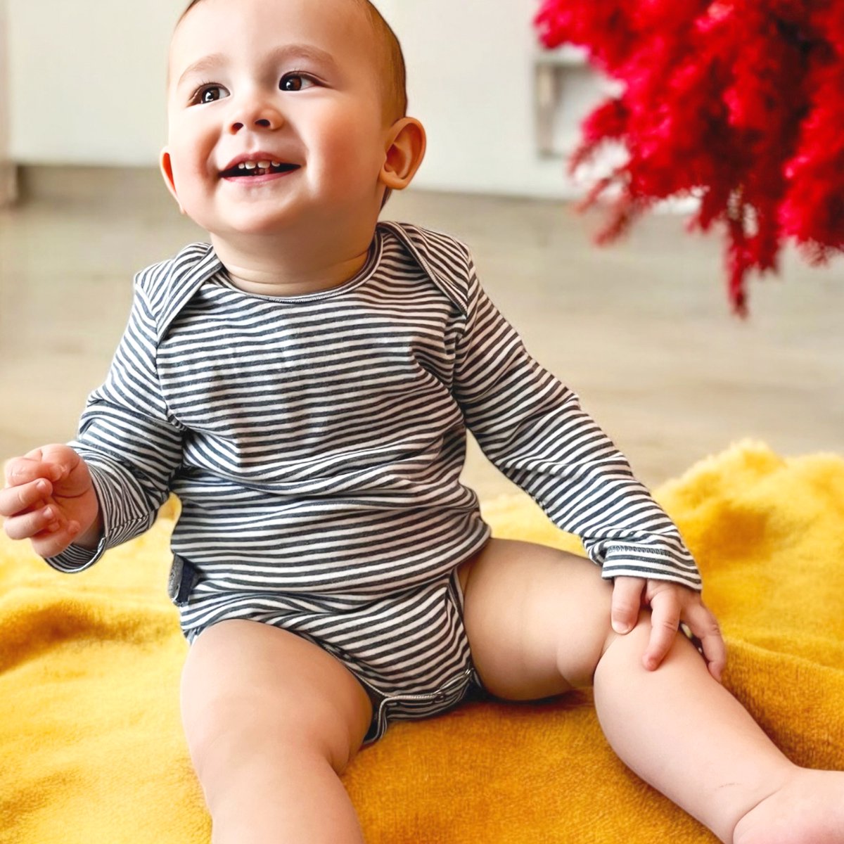 Babyrompertje met lange mouwen OrganicEra biologische baby rompertje met lange mouwen, gestreept