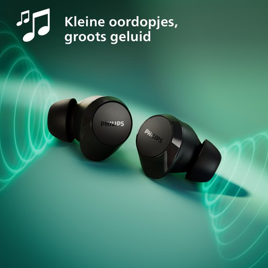 Zwarte oordopjes met Philips logo, omgeven door groene geluidsgolven.