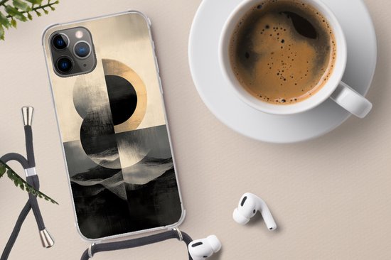 iPhone 13 Pro Max hoesje met abstracte cirkels in beige, zwart en grijs. De hoes is doorzichtig met een koord.