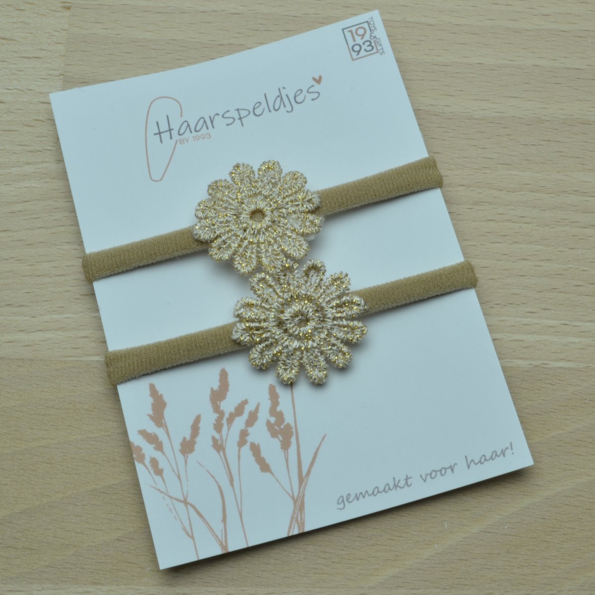 Haarelastiekjes Lara by 1993 - gouden bloem - haaraccessoires - 2 haarelastiekjes