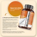 Fles biologische kurkuma capsules met Nederlandse gebruiksaanwijzing. Ingrediënten: Kurkuma, gember, zwarte peper.