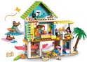 LEGO Friends strandhuis met minipoppen, kajak, surfplank en zeehonden.