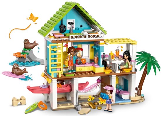 LEGO Friends strandhuis met minipoppen, kajak, surfplank en zeehonden.