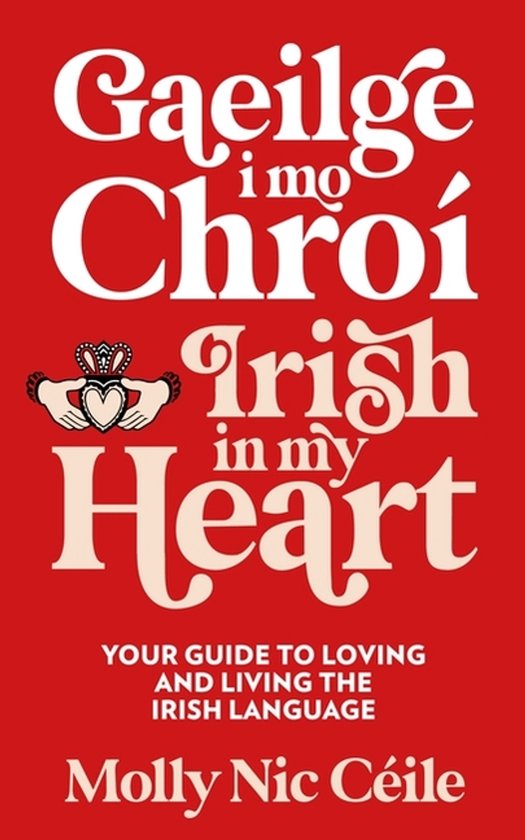 Boekomslag: Rode achtergrond met witte tekst 'Gaeilge i mo Chroí / Irish in my Heart' en een Claddagh-symbool.