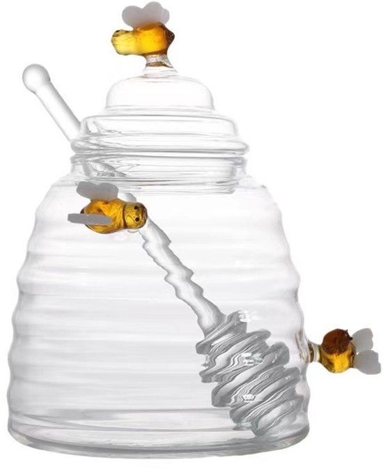 Glazen honingpot, bijenkorfvormig, met bijen-decoratie en lepel.