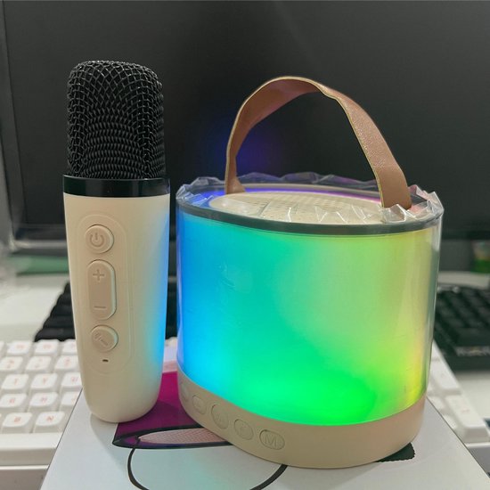Deze mini-karaokemachine is uitgerust met een draadloze microfoon, draagbare 5.3-kanaals luidsprekers, 3 watt uitgangsvermogen, 52 mm driver-units en led-verlichting. Het is een ideaal draagbaar zangsysteem — afbeelding 2