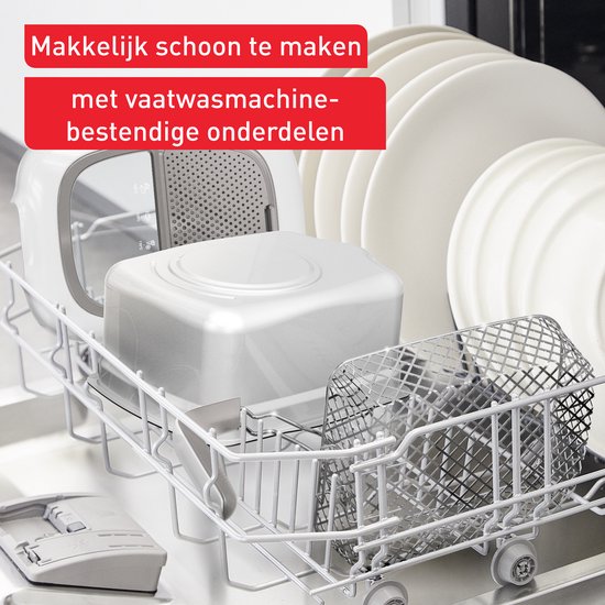 Witte Tefal frituurpan onderdelen in een vaatwasser.