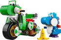 Een groene Lego-motor met een zittende blauwe Yoshi en een losse gele banaan ernaast.