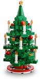 Petit sapin de Noël LEGO vert avec des ornements rouges et des bougies.