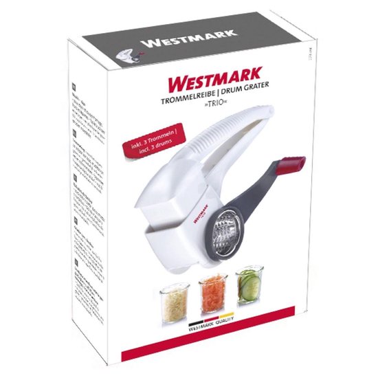 Westmark trommelrasp 'Trio' verpakking met rasp, 3 trommels en geraspte groenten.
