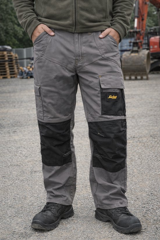 Pantalon de travail 3/4 Snickers Ripstop Pirate Trousers – Gris foncé/Zwart – Taille 42