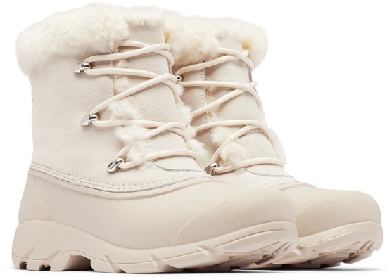 Paar crème kleurige dames snowboots van Sorel met witte bontkraag en veters.