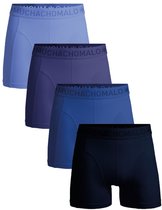 Vier Muchachomalo boxershorts in verschillende tinten blauw en paars, met logo op de tailleband.