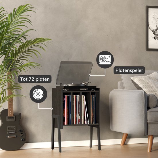 Zwart vinyl opbergsysteem met platenspeler en gitaar in een woonkamer. Tot 72 platen.