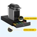Porte-capsules noir avec tiroir pour capsules Nespresso, 50 pièces. Tiroir coulissant pratique et dessous antidérapant.