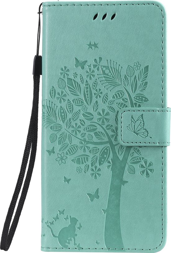 Coque de téléphone verte avec imprimé d'un arbre, de papillons et d'un chaton. Avec bracelet.