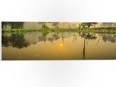 PVC Schuimplaat- Zonnestralen over Overstroomd Gebied in Indonesië - 60x20 cm Foto op PVC Schuimplaat