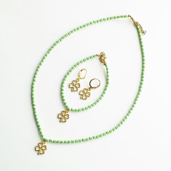 Set ketting, armband en oorbellen in groentinten met klavertje vier
