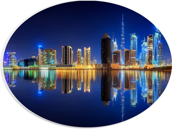 PVC Schuimplaat Ovaal - Skyline van Dubai met Weerspiegeling in de Zee, Qatar - 28x21 cm Foto op Ovaal (Met Ophangsysteem)
