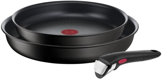Zwarte Tefal koekenpannen op elkaar met een afneembare zwarte handgreep met rode knop.