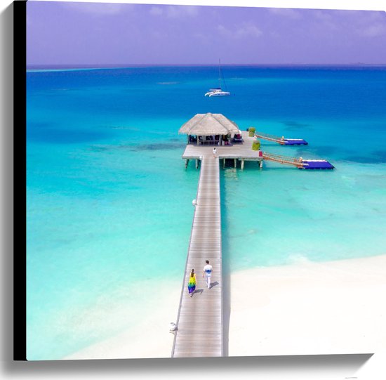 Canvas - Stijger met Huisje op Zee en helder Blauw Water - Malediven - 60x60 cm Foto op Canvas Schilderij (Wanddecoratie op Canvas)