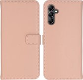Selencia Hoesje Geschikt voor Samsung Galaxy A14 (5G) / A14 (4G) Hoesje Met Pasjeshouder - Selencia Echt Lederen Bookcase - roze