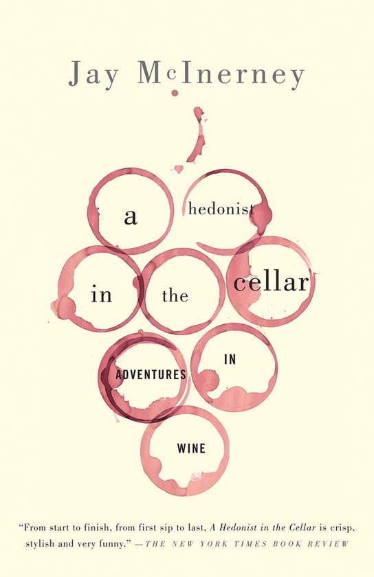 Boek "A Hedonist in the Cellar" met een druiventros van wijnvlekken. Titel van Jay McInerney.