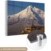 MuchoWow® Glasschilderij 60x40 cm - Schilderij acrylglas - De besneeuwde Aziatische Ararat berg tijdens zonsopgang - Foto op glas - Schilderijen