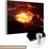 MuchoWow® Glasschilderij 120x80 cm - Schilderij acrylglas - Gloeiende lava stromend uit vulkaan - Foto op glas - Schilderijen