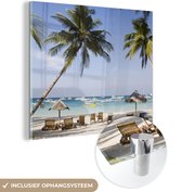 MuchoWow® Glasschilderij 20x20 cm - Schilderij acrylglas - Palmbomen en ligstoelen op het strand van Boracay - Foto op glas - Schilderijen