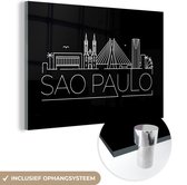 MuchoWow® Glasschilderij 90x60 cm - Schilderij acrylglas - Stadsaanzicht "Sao Paulo" op een zwarte achtergrond - Foto op glas - Schilderijen