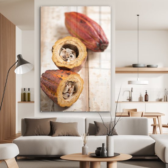 Peinture sur verre MuchoWow® - La coque de la gousse en deux avec les fèves de cacao au milieu - 100x150 cm - Peintures sur verre acrylique - Photo sur Glas