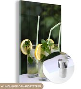 MuchoWow® Glasschilderij 80x120 cm - Schilderij acrylglas - Heerlijke Mojito cocktails in een groene omgeving - Foto op glas - Schilderijen