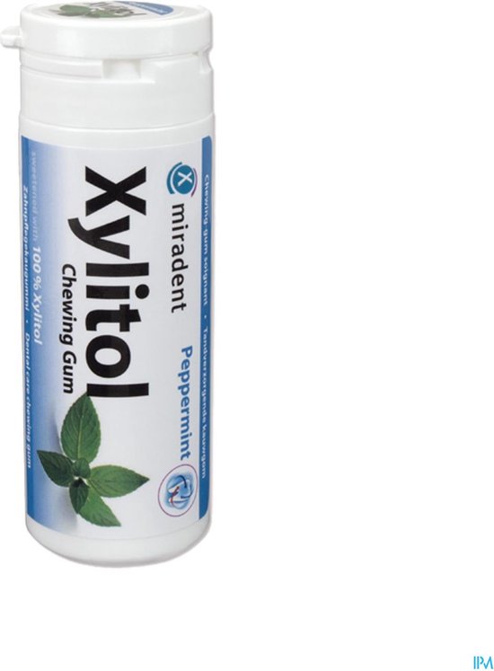 Witte Miradent Xylitol kauwgom potje met pepermunt smaak en groene bladeren.