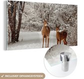 MuchoWow® Glasschilderij 160x80 cm - Schilderij acrylglas - Herten - Sneeuw - Bomen - Foto op glas - Schilderijen