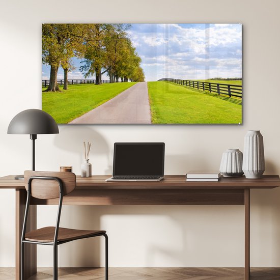 MuchoWow® Glasschilderij 120x60 cm - Schilderij acrylglas - Wolken - Bomen - Weg - Foto op glas - Schilderijen