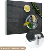 MuchoWow® Glasschilderij 80x60 cm - Schilderij acrylglas - Cocktail - Glas - Limoen - Foto op glas - Schilderijen