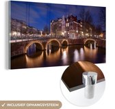 MuchoWow® Glasschilderij 40x20 cm - Schilderij acrylglas - Amsterdam - Water - Nacht - Foto op glas - Schilderijen