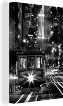 Canvas Schilderij De tram van San Francisco in de nacht - zwart wit - 120x180 cm - Wanddecoratie XXL