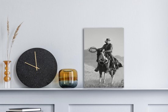 Peinture sur toile Un cow-boy sur un cheval gris ciel - noir et blanc - 20x30 cm - Décoration murale
