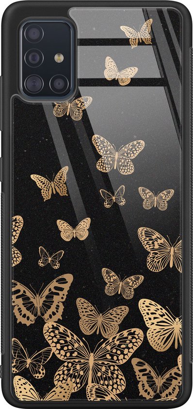 Coque noire en verre avec imprimé papillon doré.